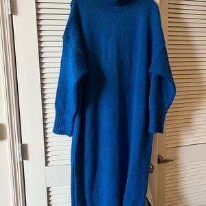 Elegant Blue Turtleneck Sweater by [Brand]